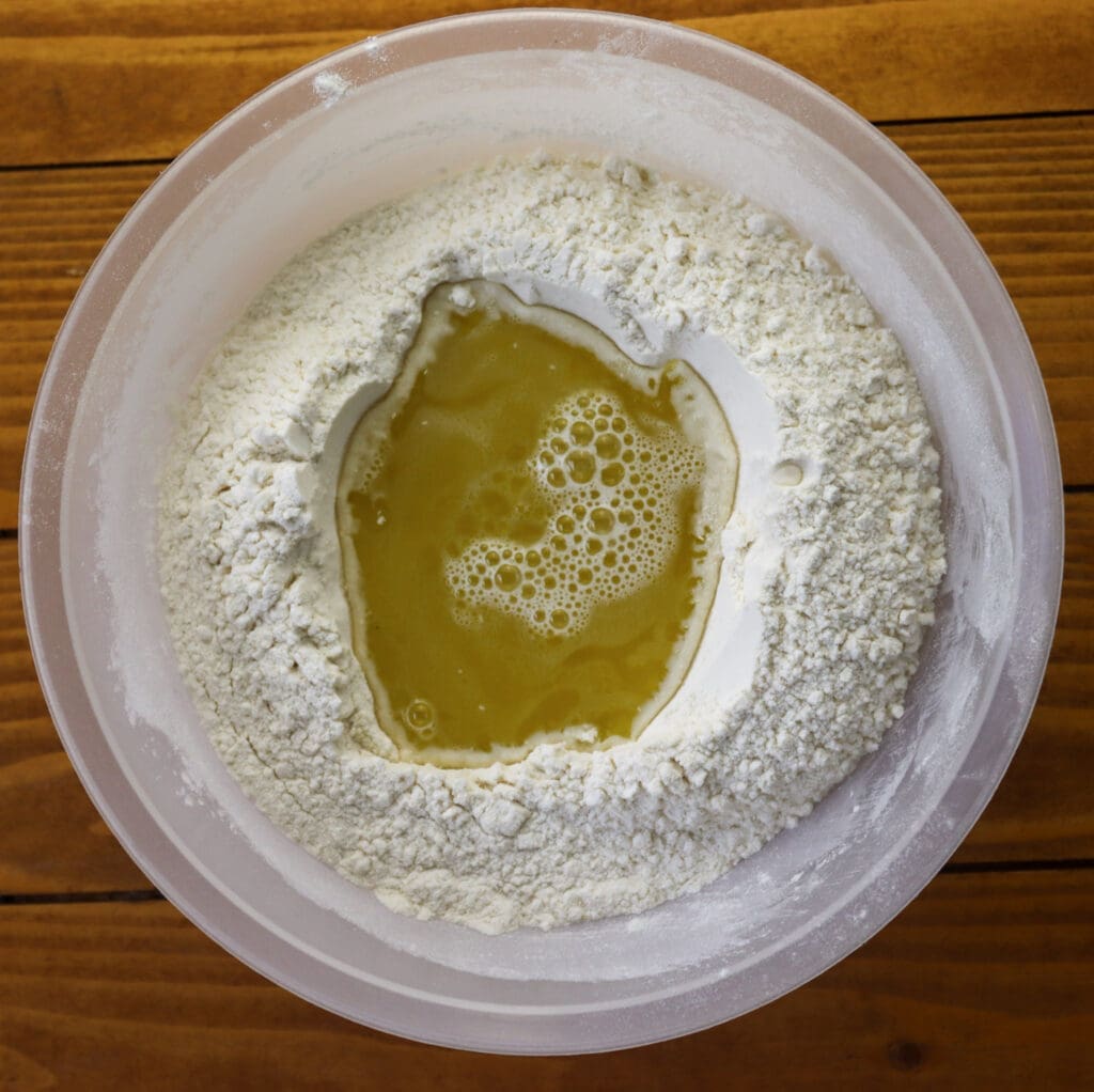 adding olive oil to the dry ingredients